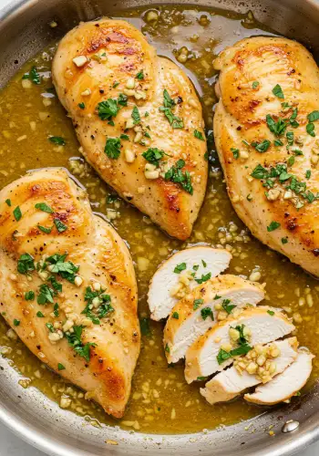 Delicious chicken dinner dish served with herbs and fresh garnish – perfect for family meals