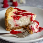 Vegan White Chocolate Cheesecake with Raspberry Coulis